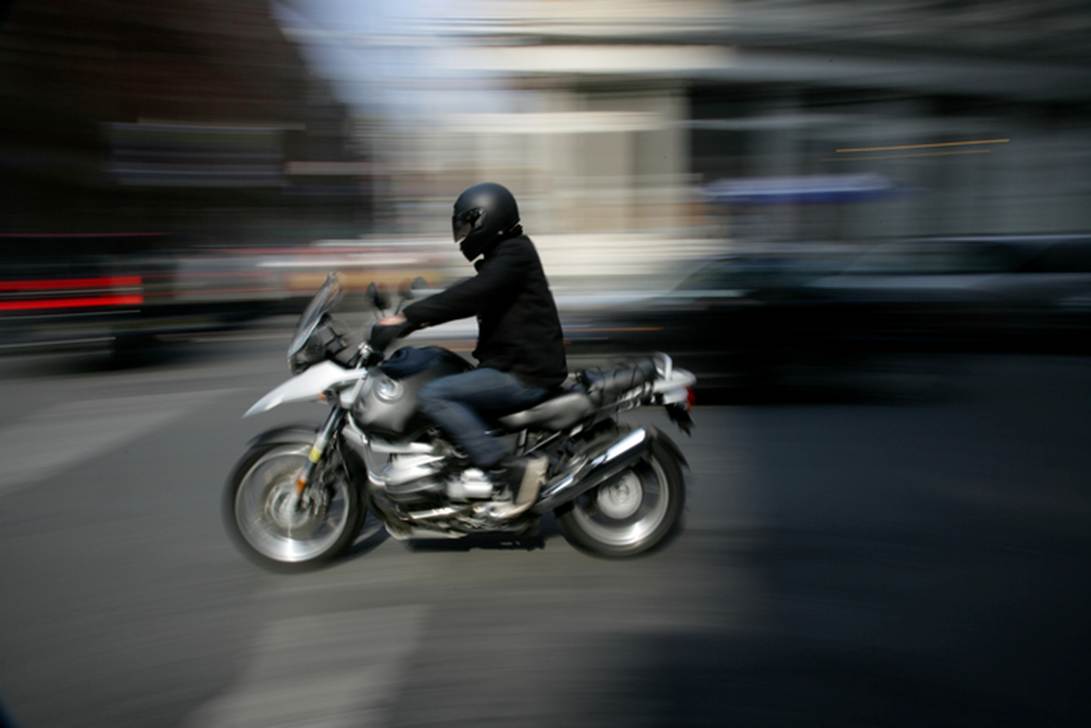 A person riding a motorcycle

AI-generated content may be incorrect.